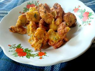 Corn dumplings Indonesian Food that is simple and often made at home. Perkedel Jagung Indonesian Street Food.