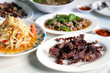 Esan Thai food Dried meat, papaya salad, Spicy minced pork
