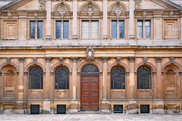 Fototapeta na wymiar OXFORD, ENGLAND - The Palladian facade of the Oxford University's Sheldonian Theatre, designed by Christoper Wren in the 1600s