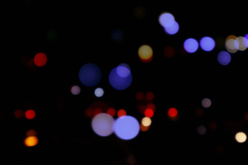 Bokeh night ligh Beautiful bokeh light on a black background with various colors, Blurred of car in city at night