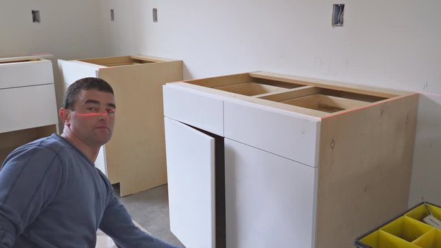 Blind cabinet island drawers and counter cabinets installed of white color