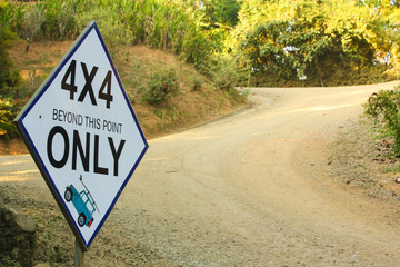 Steep Road Ahead: 4X4 only sign.