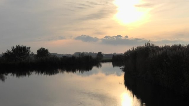 Sunset at 'De Zweth' river in Oude Leede, the Netherlands