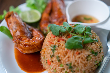 Closed up of famousThai food Tom yum Kung fried rice with shrimp and egg background.