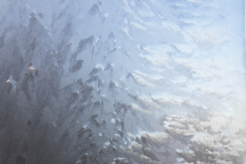 Texture of frost patterns on the window. Abstract winter background
