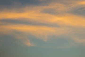 Blue and orange sky with many cloudy background, twilight sky after sunset.