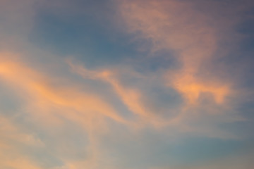 Blue and orange sky with many cloudy background, twilight sky after sunset.