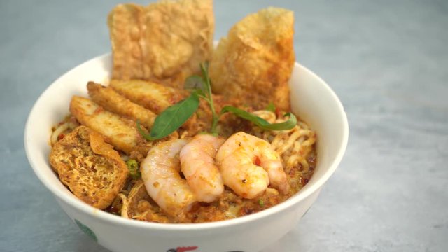 penang curry noodle with slate background