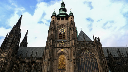 Fototapeta na wymiar shot of the clock tower of st vitus cathedral in prague