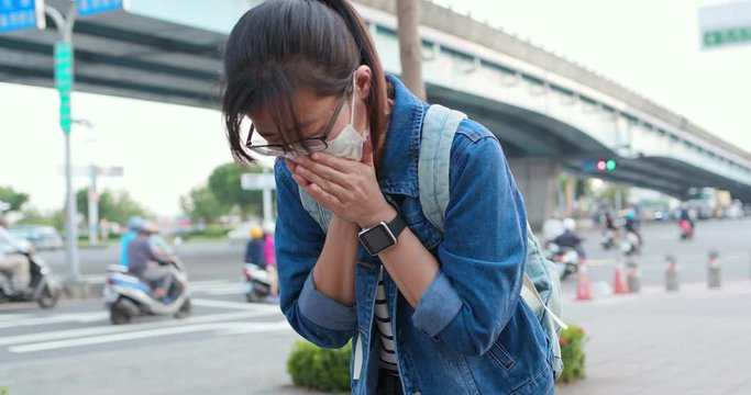 woman feel sick and cough