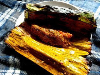 Traditional indonesian culinary food. Masakan Pepes Ikan Bakar or grilled steamed fish. Pepes Ikan Indonesian Food that is simple and often made at home. Indonesian Street Food.