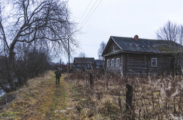 Fototapeta na wymiar brown rural house, dilapidated house, autumn