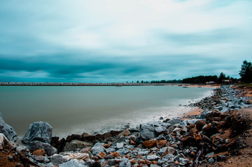 Seaside landscape with clouds and smooth water