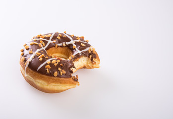 donut or donut with missing bite on a background new.