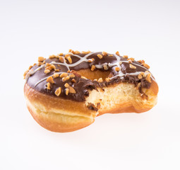 donut or donut with missing bite on a background new.
