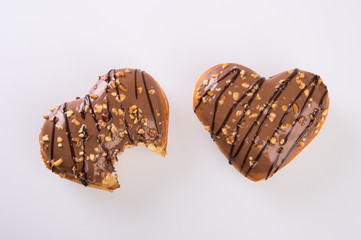 donut or donut with missing bite on a background new.