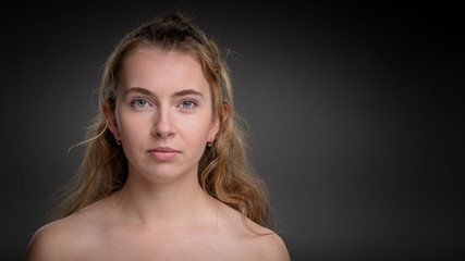 Fototapeta premium Head & shoulders portrait of an attractive caucasian woman