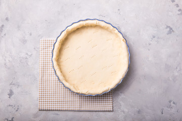 Step by step Pie recipe. Individual open chicken mushroom tart  with puff pastry crust. Top view,  grey stone table