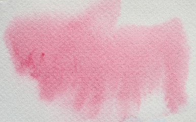 Watercolor stroke and spray on white paper , Abstract background and texture by hand drawn with red and pink color liquid drip