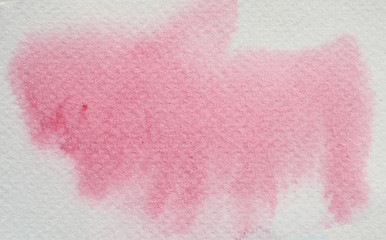 Obraz premium Watercolor stroke and spray on white paper , Abstract background and texture by hand drawn with red and pink color liquid drip
