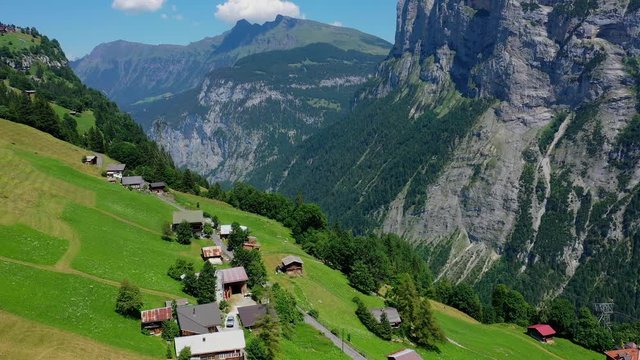 Small village of Gimmelwald in the Swiss mountains - Switzerland from above - aerial photography