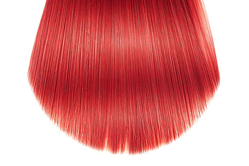 Red hair close-up on white background, isolated. Carefully trimmed tips