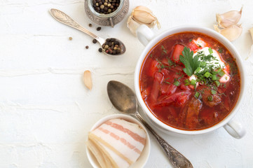 traditional Ukrainian Russian soup (borscht) from beet with greens and sour cream.