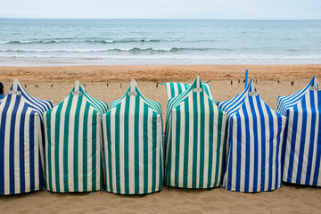 Fototapeta na wymiar Beach dressing tents