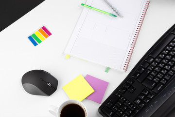 Office workplace table with supplies and coffee cup. Flat lay. Top view with space for your text