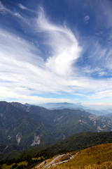 The magnificent mountain scenery in the high mountains of central Taiwan, the clouds in the sky also show a changeable appearance is very beautiful