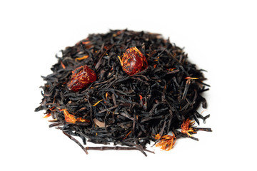 Fototapeta premium A bunch of black tea with berries isolated on a white background