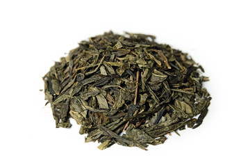 Classic green tea isolated on white background. Tea leaves closeup