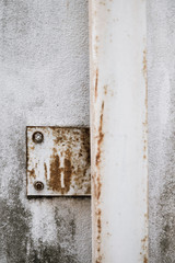 Rusty tightened bolt and nut on the construction part of the building