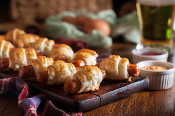 Pigs in blankets. Dark mood