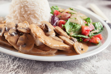 Chicken escalopes with champignion in creamy sauce