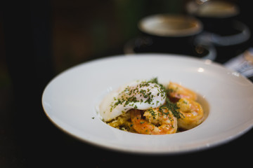 shrimp dish with poach egg