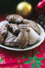 Gingerbread cookies on table, with Christmas decoration; festive food