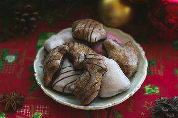 Gingerbread cookies on table, with Christmas decoration; festive food