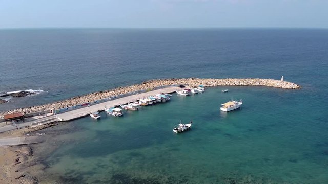 Drone shot over the small port of Agios Georgios Peyia in Cyprus.