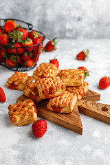 Sweet delicious strawberry cookies with ripe stawberries,top view