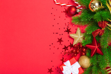 Christmas holidays composition on red background with copy space for your text