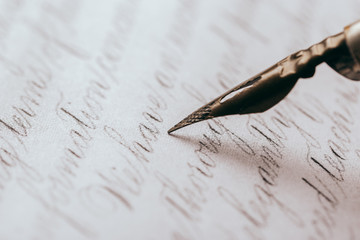 Fountain pen on an ancient handwritten letter. Old story. Retro style. - obrazy, fototapety, plakaty