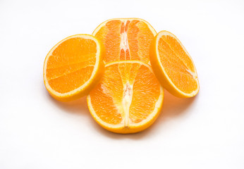 chopped oranges lie on the table