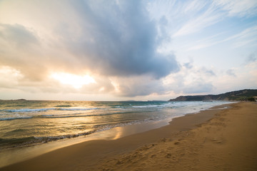 Fototapeta na wymiar golden sunset on the Greece beach