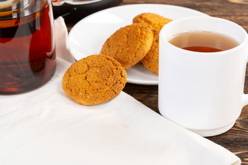 Tea served on a wooden kitchen table
