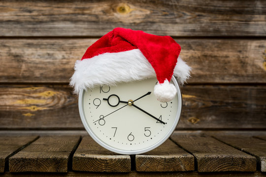 Christmas time - clock with Santa hat