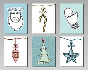 Doodle Christmas cards Set. Cute hand drawn winter design elements for poster, banner or invitation. New Year symbols. Vector illustration