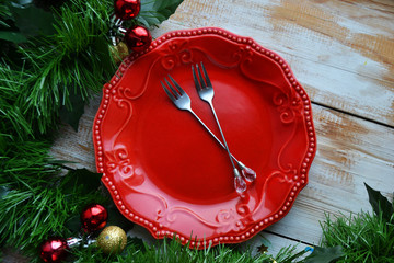 Christmas table, Red plate, green branch
