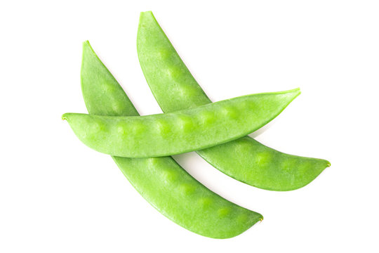 Organic snow peas, isolated on white background. Top view.