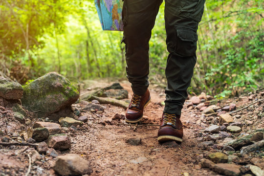 Close Up Hiking Man With Trekking Boots Walking In The Forest